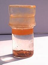 Phosphorus under water under benzene.